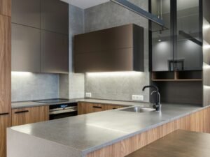 Sleek and modern kitchen with contemporary appliances and wooden cabinetry.