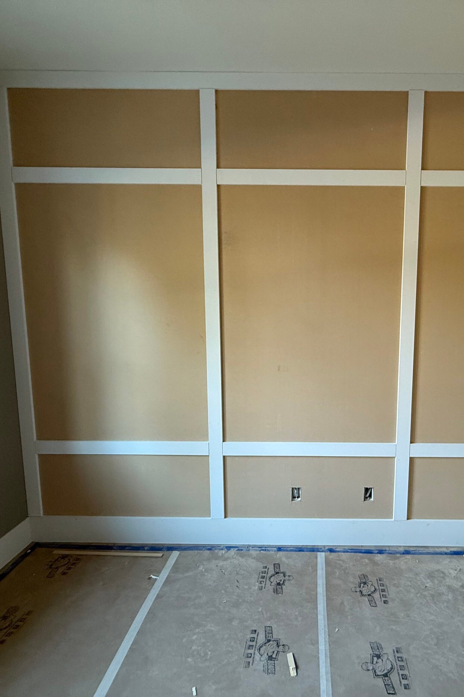 Garage conversions contractors has done molding in new created room.